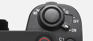 Ảnh cận cảnh cần gạt zoom trên thân máy ảnh