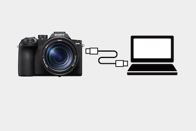 Hình minh họa thể hiện kết nối cáp USB giữa máy ảnh và PC